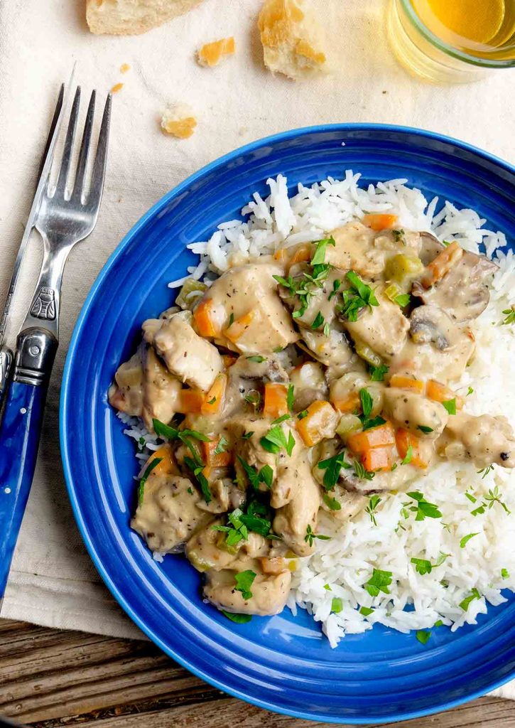 A Timeless Dish for Chicken a la King: Savory Chicken and Vegetables Piled High on Rice or Pasta