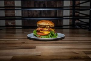 "Tasty Burger Bowls Drizzled with Signature Sauce and Accompanied by Ranch-Infused Fries"
