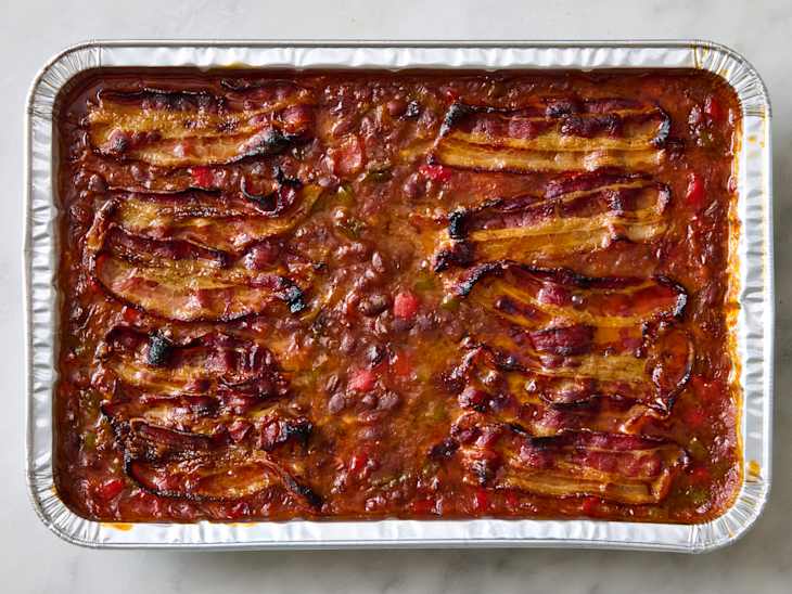 ree drummond recipe for baked beans in an aluminum baking dish