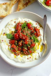 Burrata Cheese Accompanied by Crushed Cherries and Pistachios