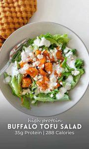 Crispy Buffalo Tofu Accompanied by Caesar Salad