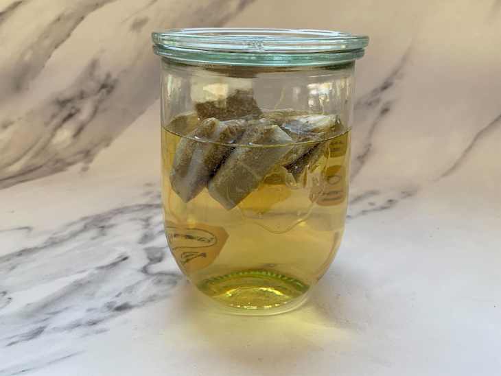 Chamomile wine in jar.