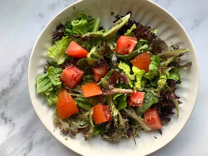 Salt flakes on home made tomato salad.