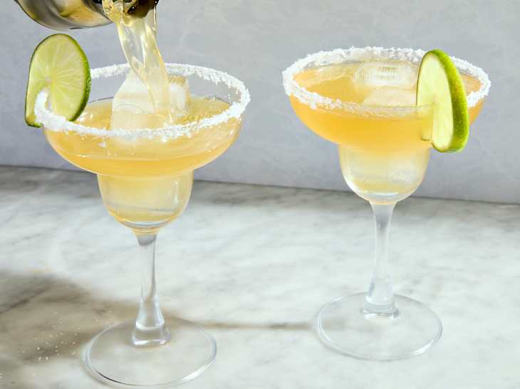 two cadillac margaritas on marble