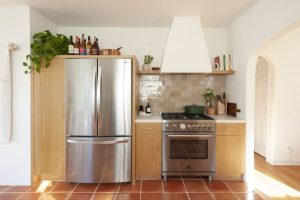 My Brilliant Trick for Cleaning Under My Fridge Without Breaking My Back (or Moving It!)