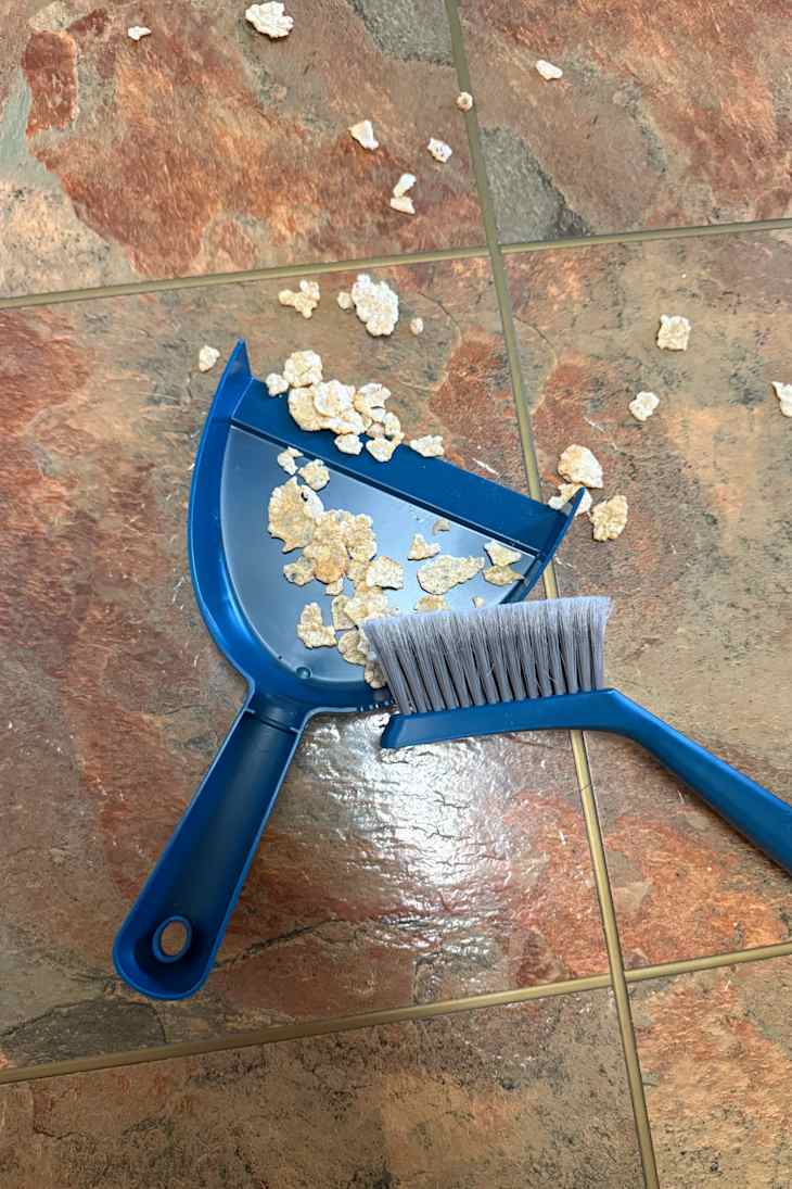 Full Circle Clean Ocean Mini Dustpan in use.