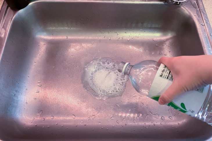 Process of cleaning the sink to remove orders and messes.
