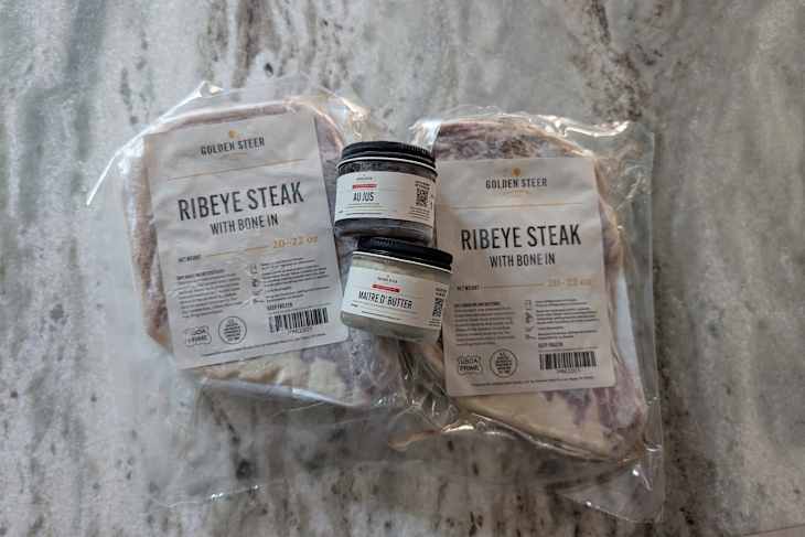 Golden Steer frozen steaks on countertop.