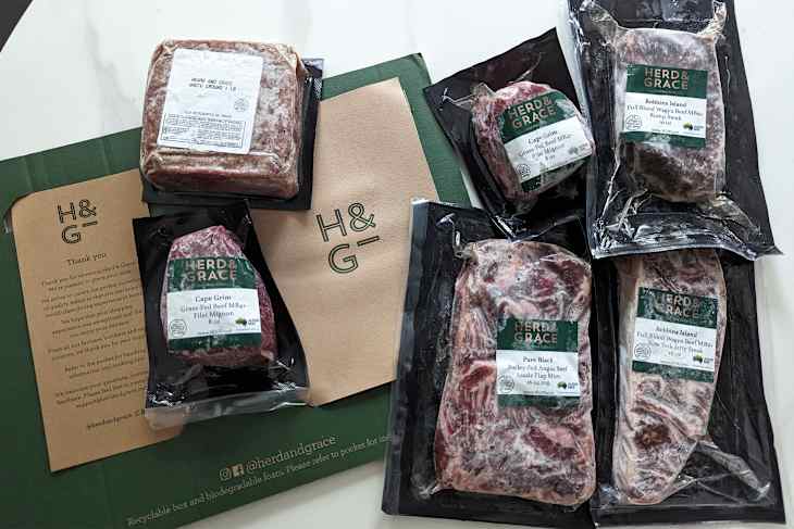 Herd and Grace frozen steaks on countertop.