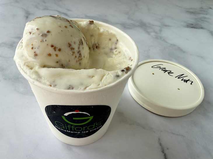 Grape nuts ice cream in container.