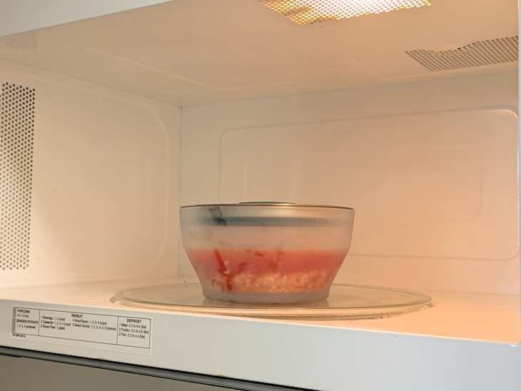 Cooking and storing with Anyday 8-Pc Microwave Cookware & Glass Food Storage Set with Glass Lids | Plastic-Free Containers | Stackable Airtight Steamer with Vented Lid for Microwave-Safe Reheating & Steaming Vegetables, Rice