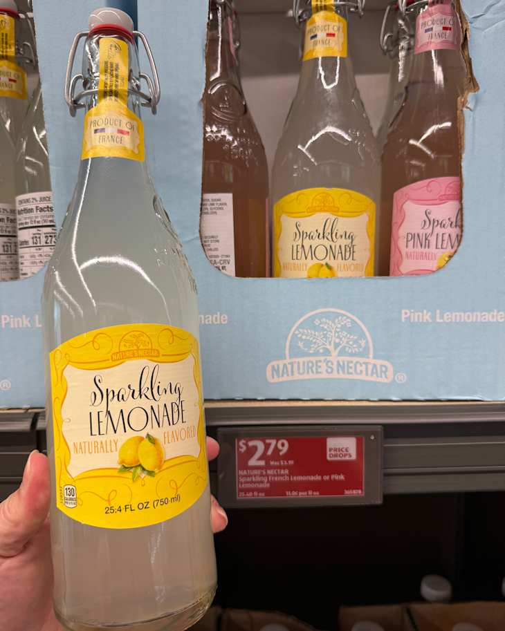 Bottle of Sparkling Lemonade with a yellow label, displayed in a store with a price tag of $2.79.