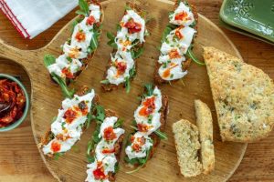 Burrata Cheese Accompanied by Crushed Cherries and Pistachios