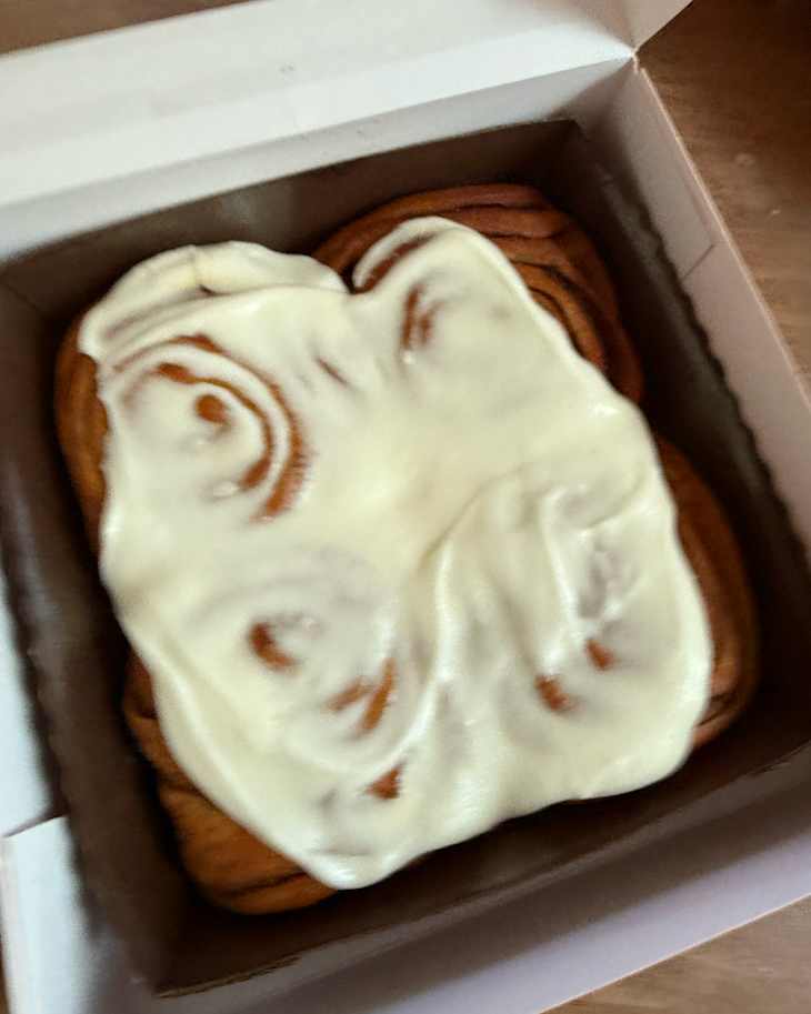 Cinnamon rolls in box.