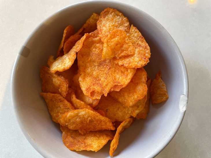 Lay's NFL Tailgating Potato Chips in bowl: Hot Sauce Flavored