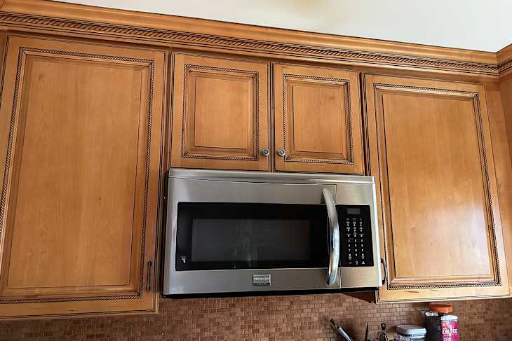 Favorite method to clean greasy kitchen cabinets uses Murphy's Oil Soap Spray.
