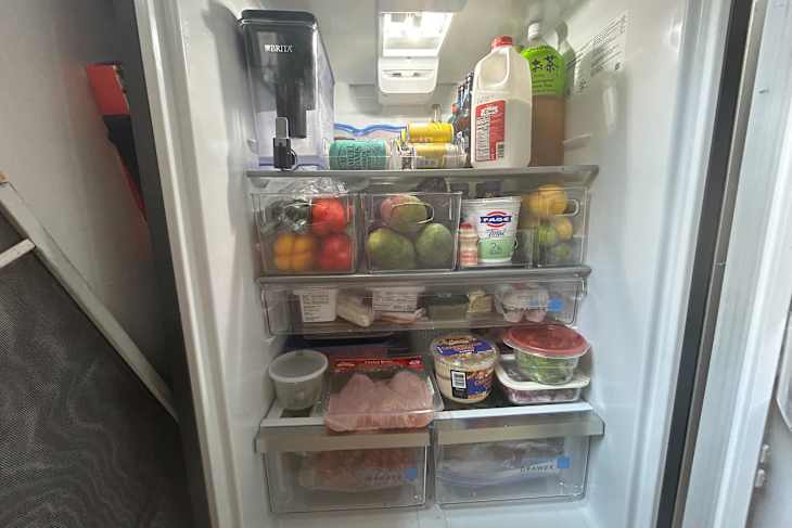 Refrigerator organized using Sorbus storage bins.