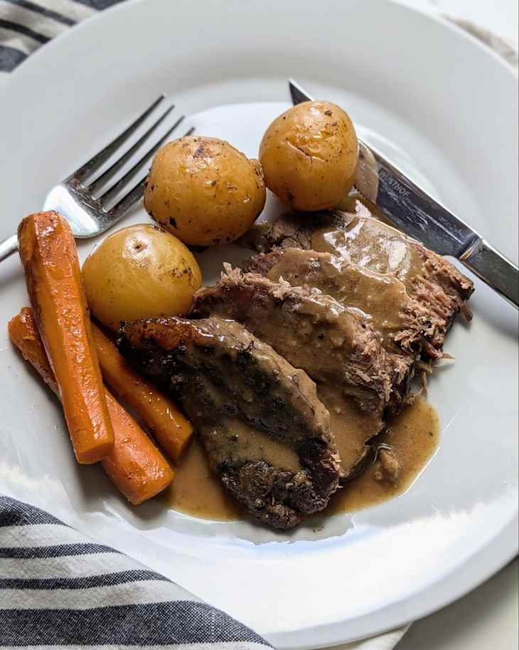 Beef with beef demi glace on top.