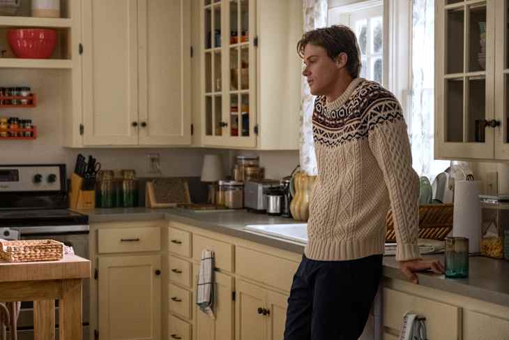 Christopher Briney (Conrad) in kitchen