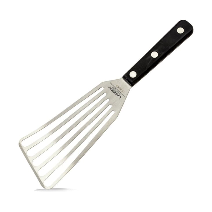 Slotted stainless steel spatula with a black handle and three rivets.