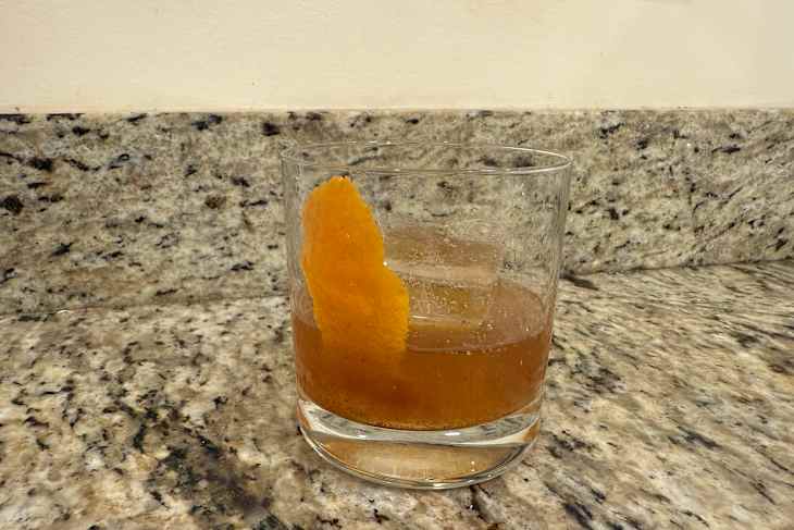 An old fashioned cocktail in a glass.