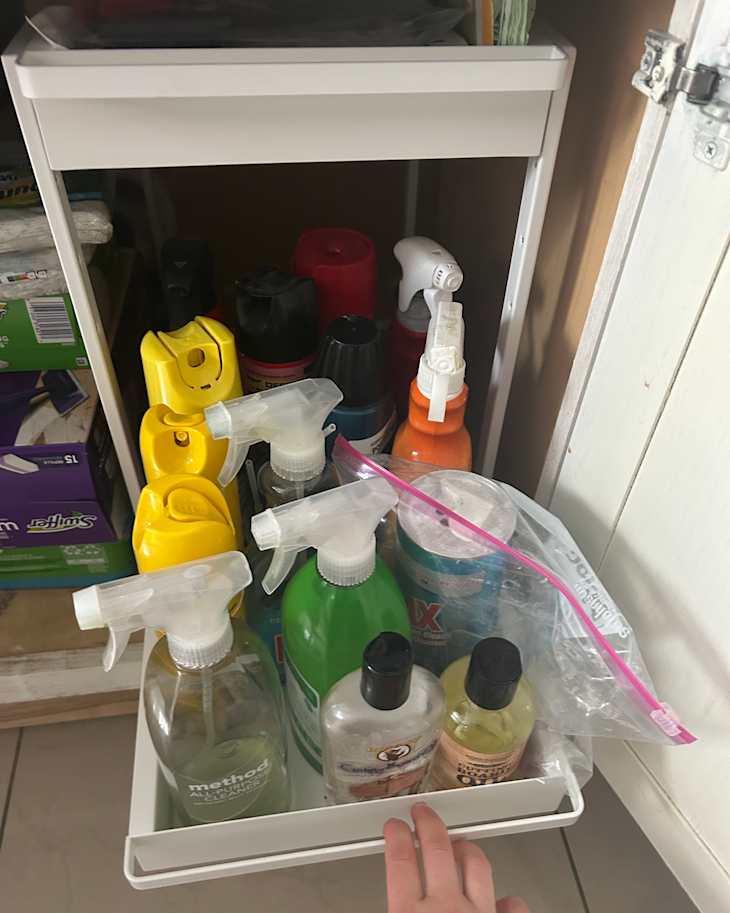 Cleaning products in Yamazaki pull out shelf.