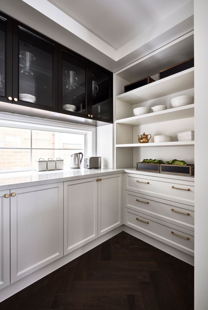 Interior photography of a butler's walk in pantry in the kitchen in a modern family home.