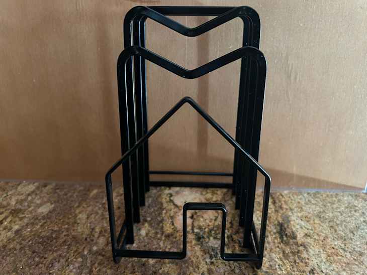 Cutting board rack on countertop.