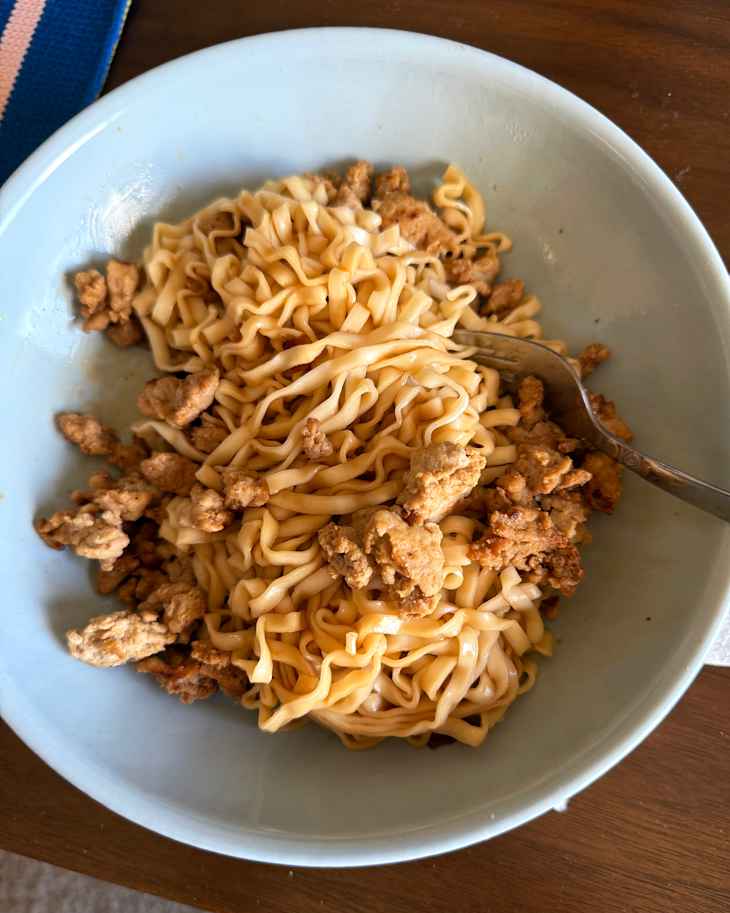 Momofuku Spicy Soy Noodles in bowl with chicken