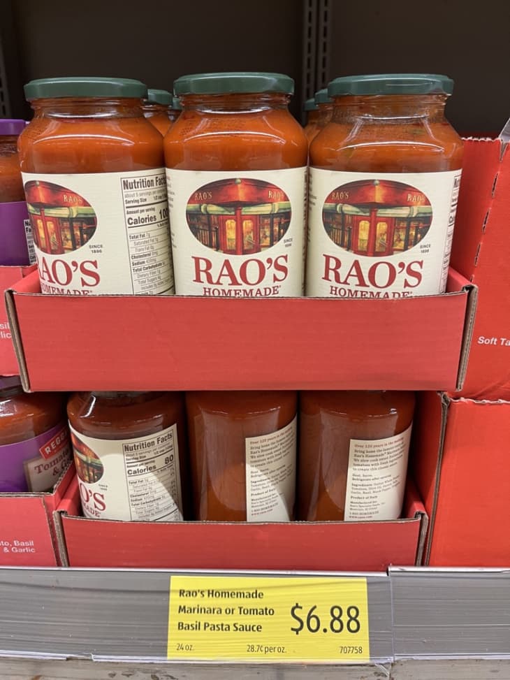 Jars of Rao's Homemade Marinara Sauce on a store shelf, priced at $6.88.