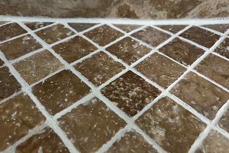 Old kitchen backsplash after grout renew colorant treatment