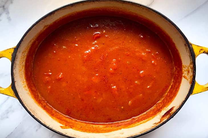 Pot of smooth red spaghetti sauce.