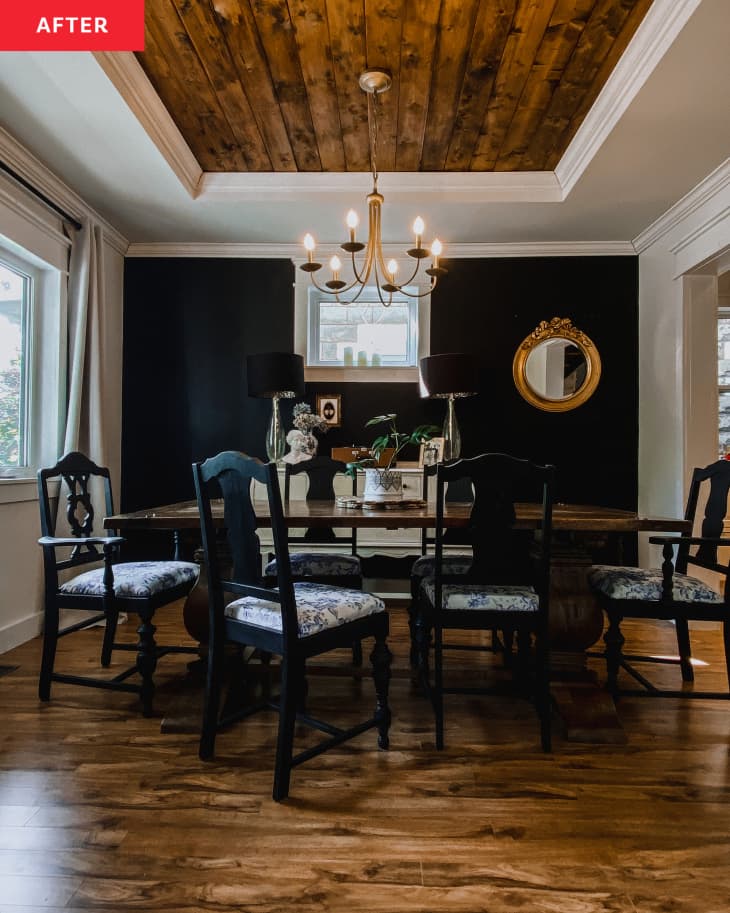 After: a white dining room with a dark accent wall