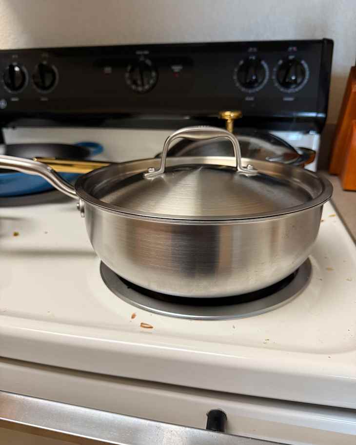 Made In pro coat nonstick saucier on stove.