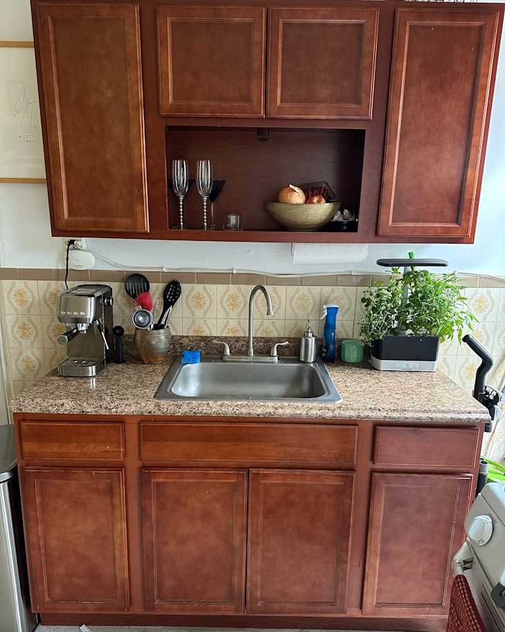 Organized kitchen sink area.