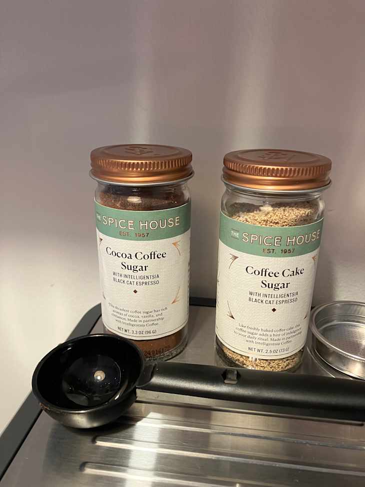 two glass jars filled with spices