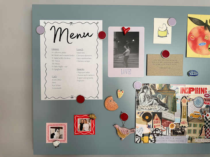 Dinner menu printed out listing weekly meals on magnetic board.