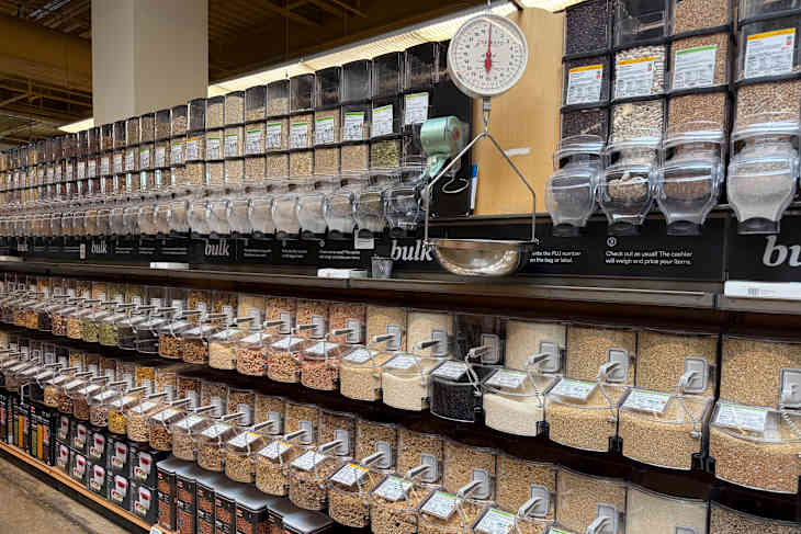 Bulk food section with clear containers.