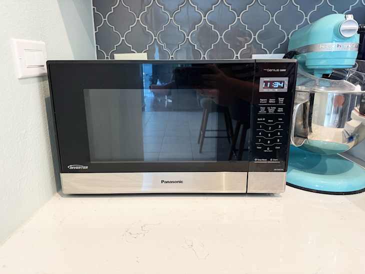 Microwave on kitchen countertop.