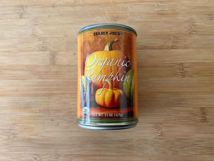 Trader Joe's Organic pumpkin puree can on countertop.