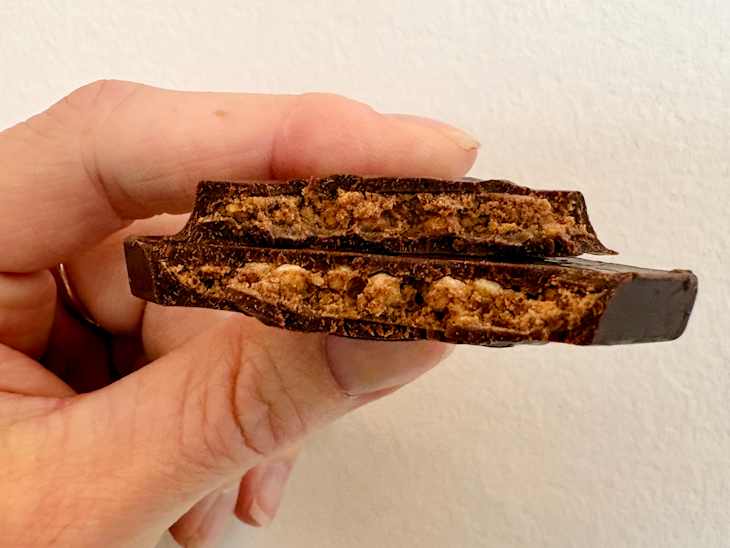 Ferrero Rocher square broken in half showing inside.