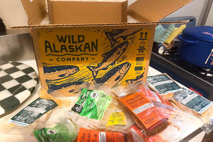 Cardboard box labeled "Wild Alaskan Company" different fillets.