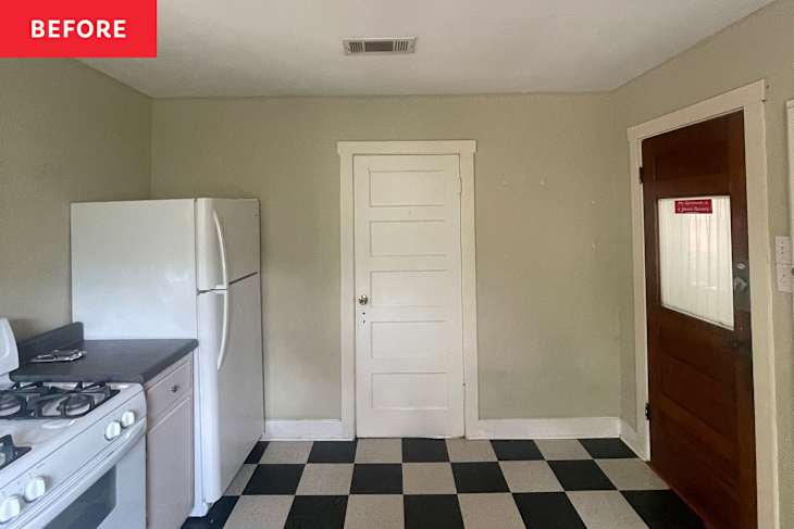 Kitchen with white appliances, white cabinets and checkered flooring