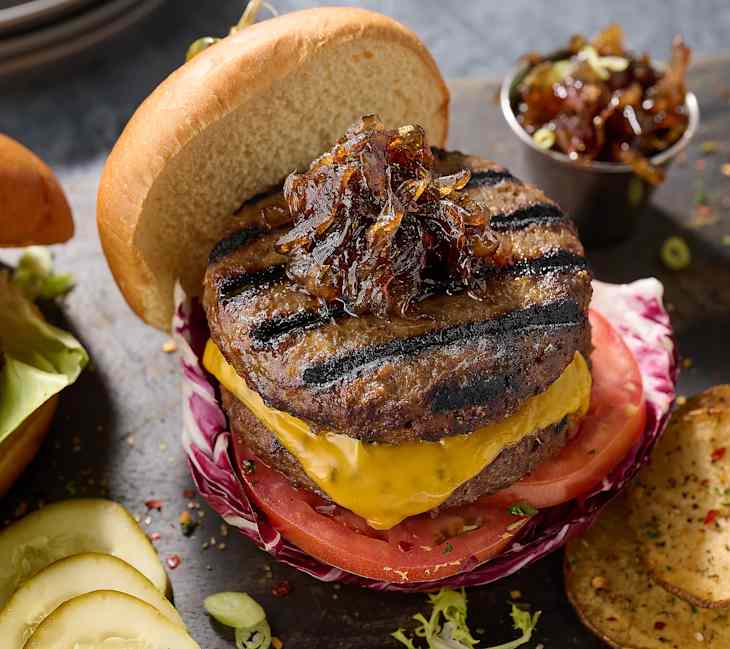 Rastelli's Black Angus French Onion Burger on bun with all the trimmings