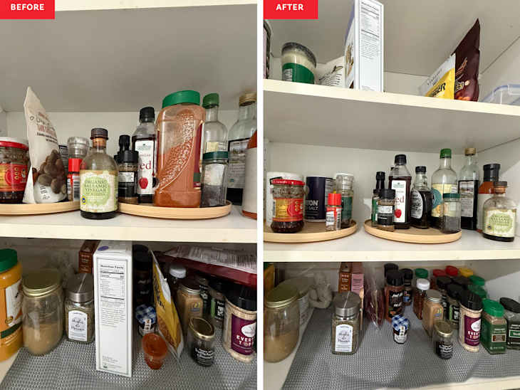 Organized pantry shelves with various bottles, spices, and jars neatly arranged on wooden trays.