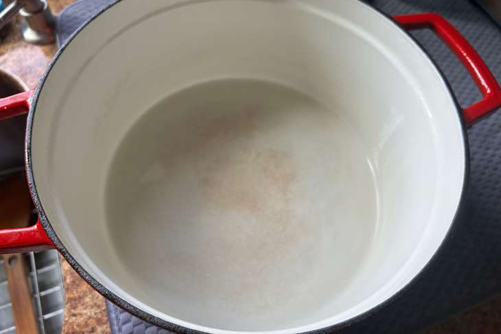 Trick to cleaning a crusty dutch oven with baking soda.