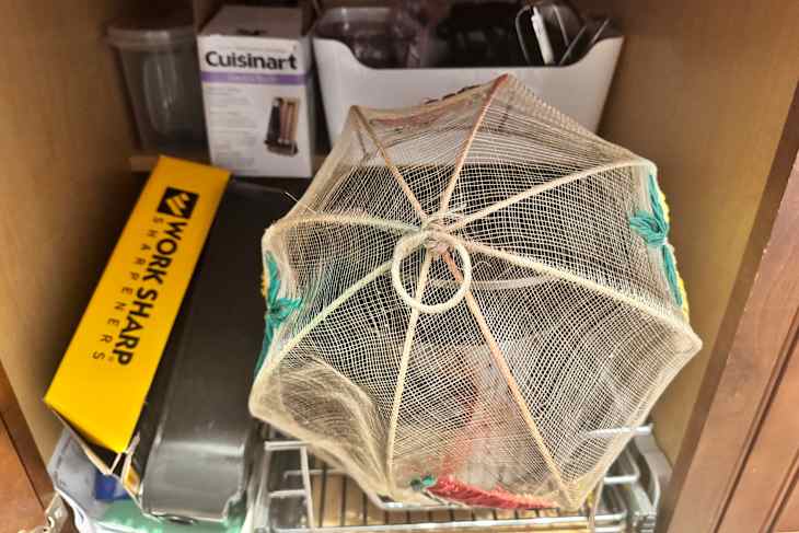 A cluttered cabinet.