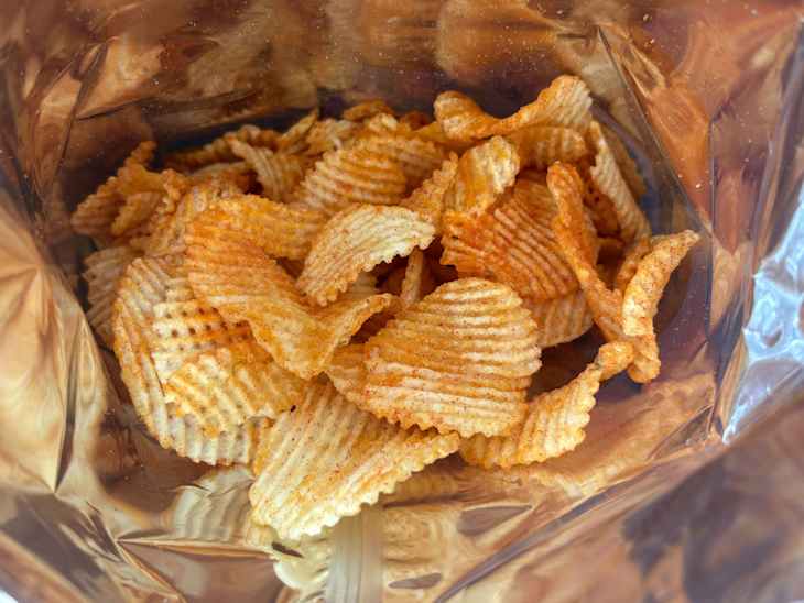 View into bag of Trader Joe’s Ketchup Flavored Lattice Potato Chips