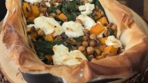 Oven-Roasted Butternut Squash with Goat Cheese and Pistachio Garnish