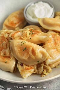 Homemade Pierogi Garnished with Buttery Onions